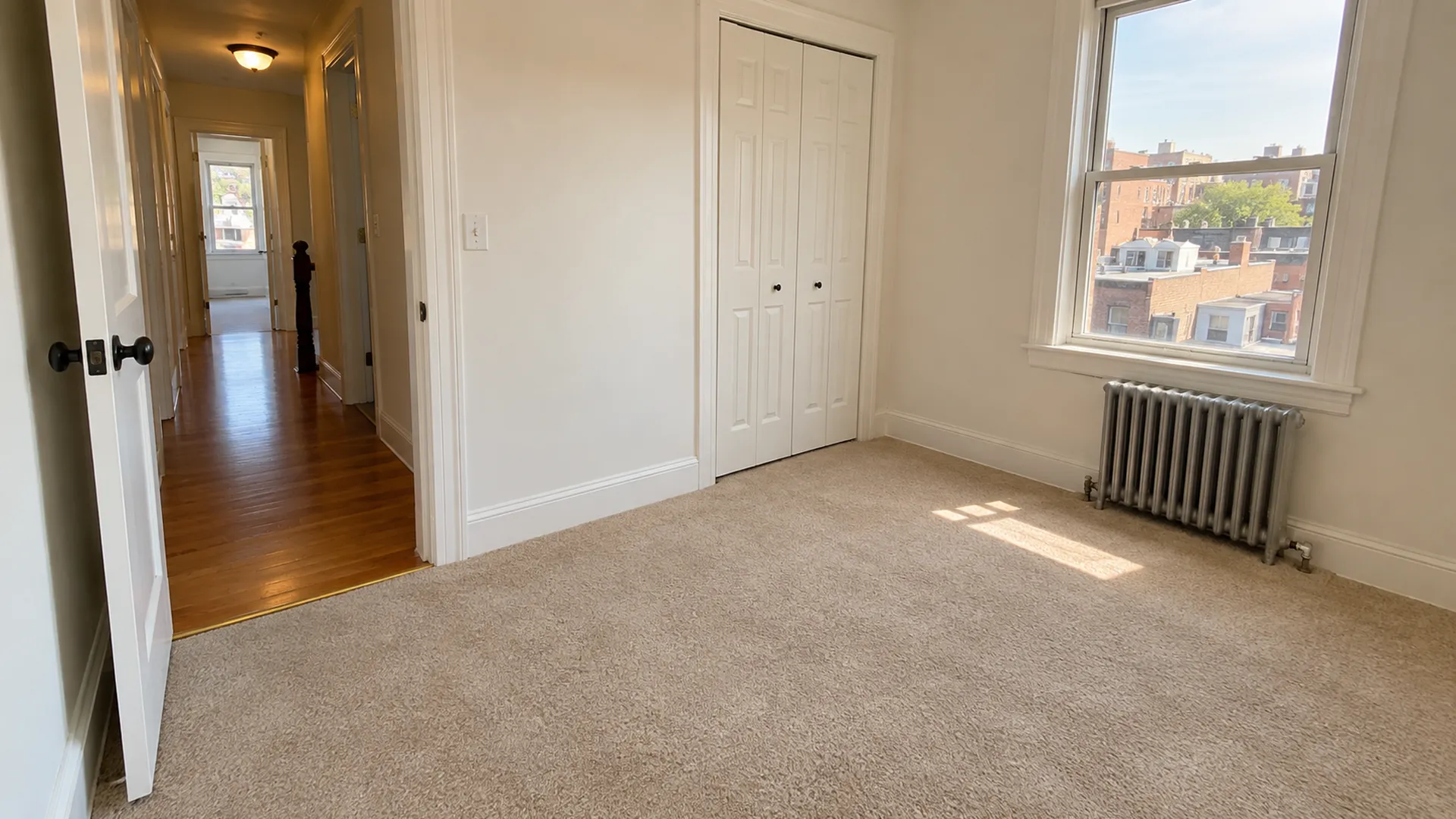 A Bronx bedroom with new wall-to-wall carpet